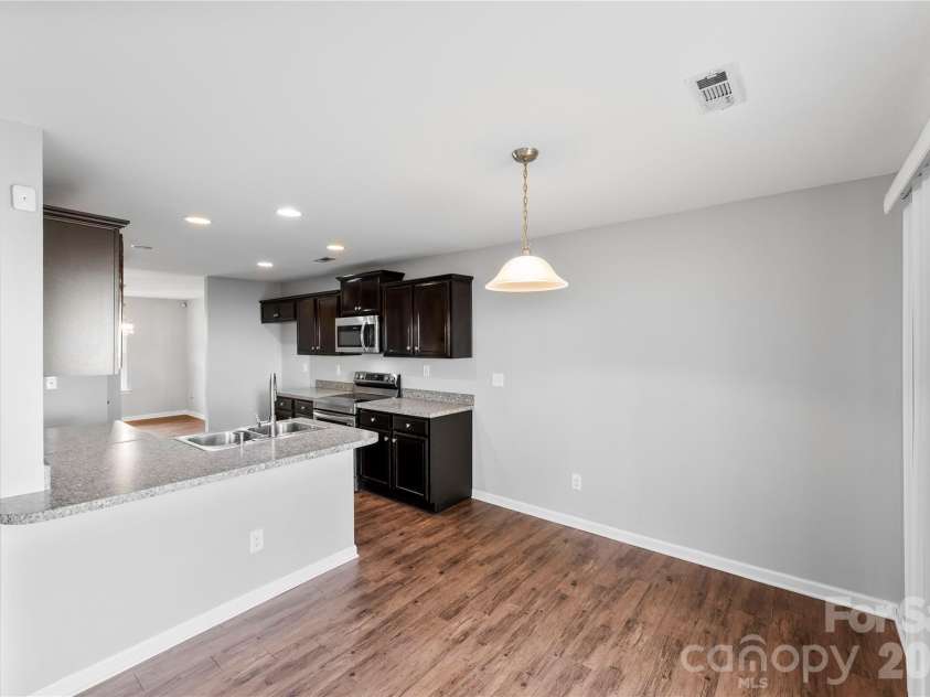 5305 Park Brook Drive, Charlotte, NC 28269.  MLS# CAR4336100, YatesRealty ID 5331. Kitchen/Sitting Area 