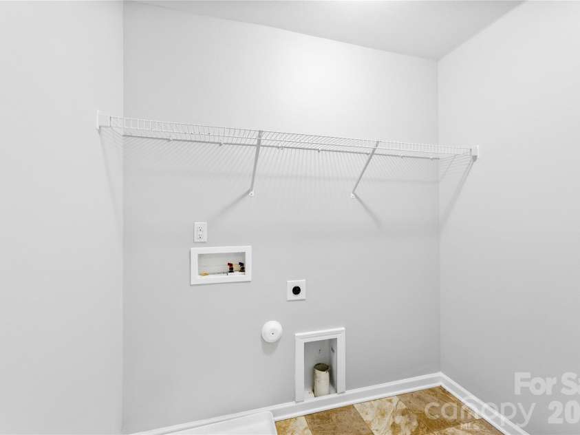 5305 Park Brook Drive, Charlotte, NC 28269.  MLS# CAR4336100, YatesRealty ID 5331. Upper Level Laundry Room