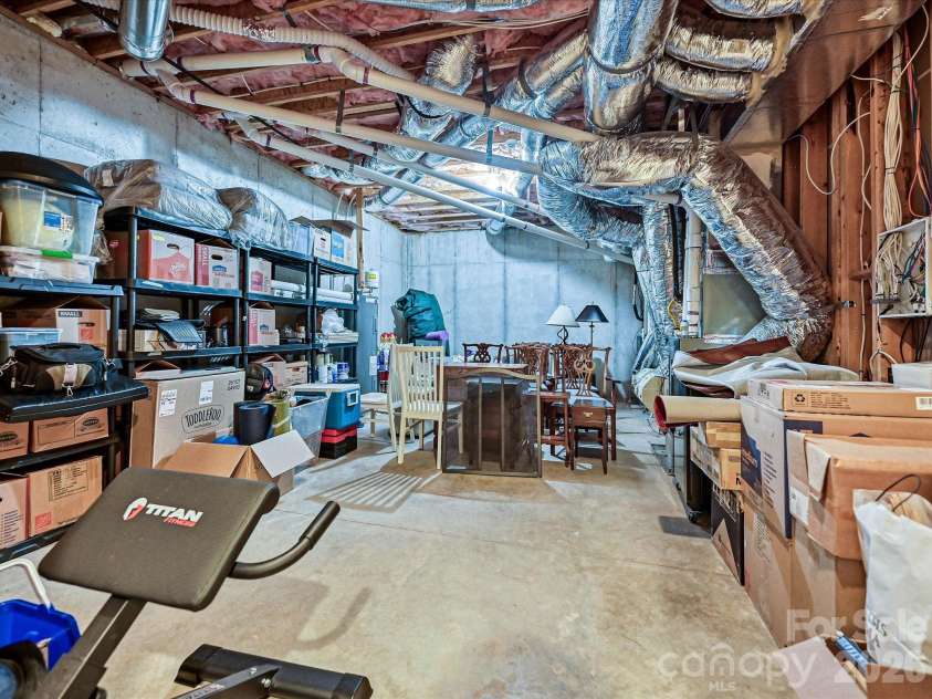 14812 Jockeys Ridge Drive, Charlotte, NC 28277.  MLS# CAR4427762, YatesRealty ID 53315. Lower level storage room