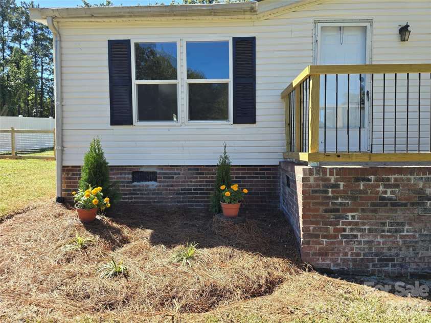 660 Childers Road, Cleveland, NC 27013.  MLS# CAR4428712, YatesRealty ID 53334. Nice Landscaping (covers septic risers)