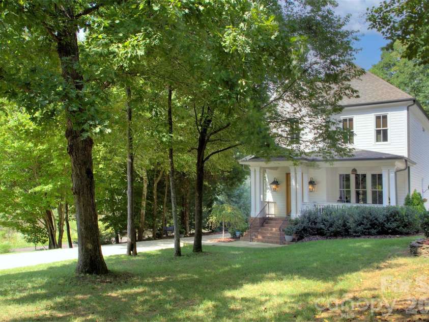2561 Lower Assembly Drive, Fort Mill, SC 29708.  MLS# CAR4423354, YatesRealty ID 53337. Home is graciously set back from the road