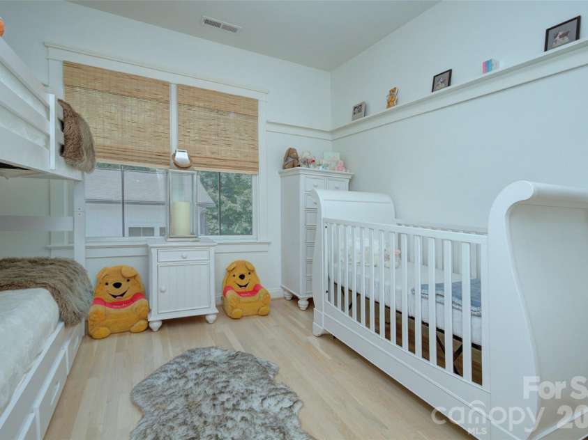 2561 Lower Assembly Drive, Fort Mill, SC 29708.  MLS# CAR4423354, YatesRealty ID 53337. Secondary bedroom with  white oak floors