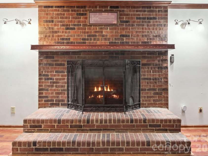 1345 Shirebourn None, Hickory, NC 28602.  MLS# CAR4428746, YatesRealty ID 53352. Gas logs virtually lit.