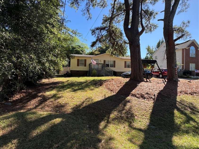 701 Friendship Drive, Matthews, NC 28105.  MLS# CAR4428444, YatesRealty ID 53354. FRONT VIEW