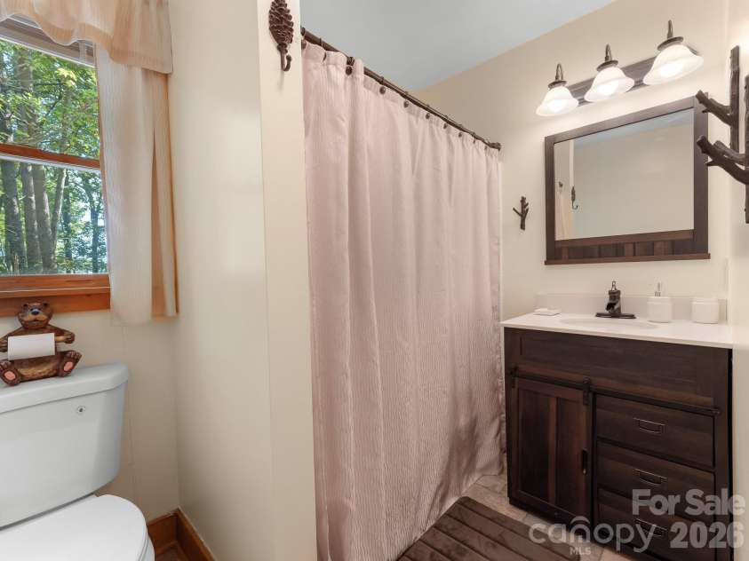 600 Piney Gate Road, Saluda, NC 28773.  MLS# CAR4423662, YatesRealty ID 53356. Bathroom has new toilet.