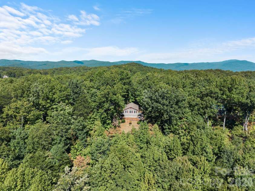 600 Piney Gate Road, Saluda, NC 28773.  MLS# CAR4423662, YatesRealty ID 53356. Drone Shot at a distance.