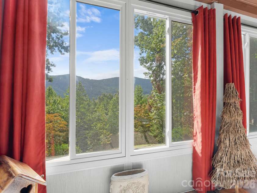 600 Piney Gate Road, Saluda, NC 28773.  MLS# CAR4423662, YatesRealty ID 53356. Great Views from Sunroom