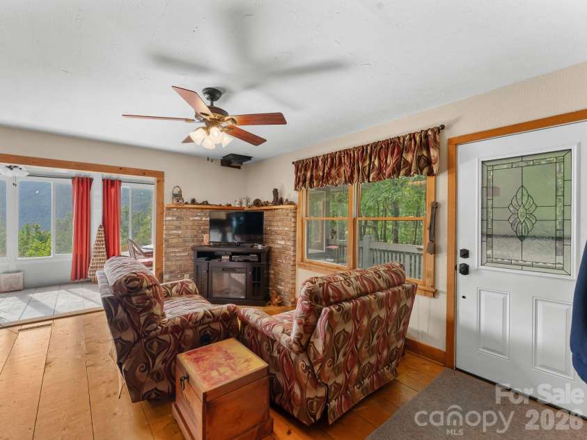 600 Piney Gate Road, Saluda, NC 28773.  MLS# CAR4423662, YatesRealty ID 53356. Living Room area