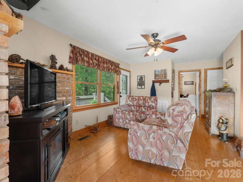 600 Piney Gate Road, Saluda, NC 28773.  MLS# CAR4423662, YatesRealty ID 53356. Living Room area