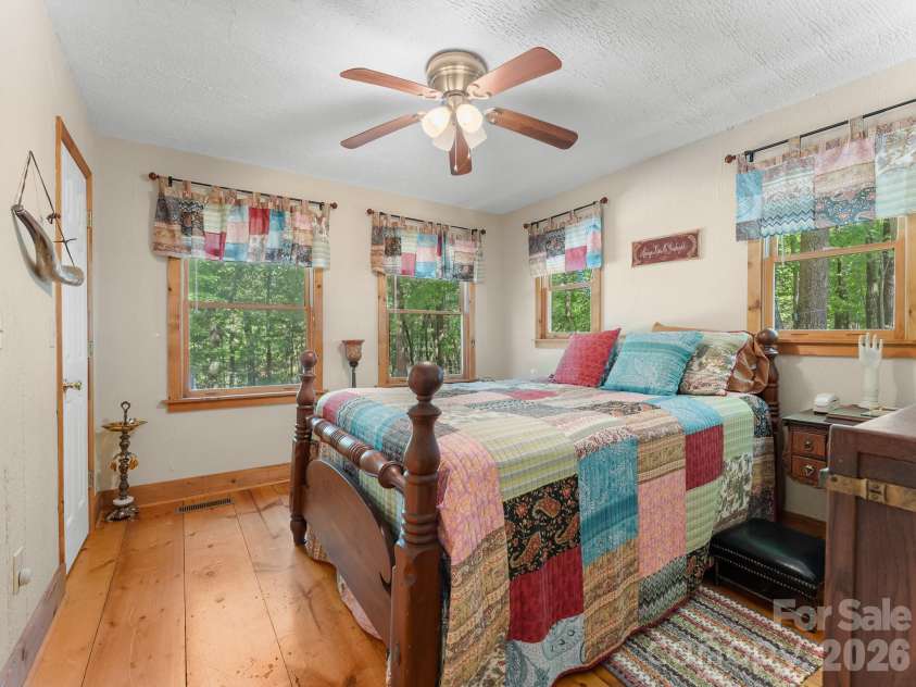 600 Piney Gate Road, Saluda, NC 28773.  MLS# CAR4423662, YatesRealty ID 53356. Primary bedroom