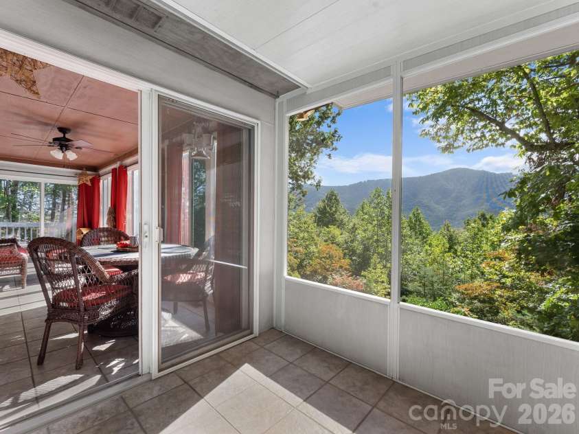 600 Piney Gate Road, Saluda, NC 28773.  MLS# CAR4423662, YatesRealty ID 53356. Screened porch