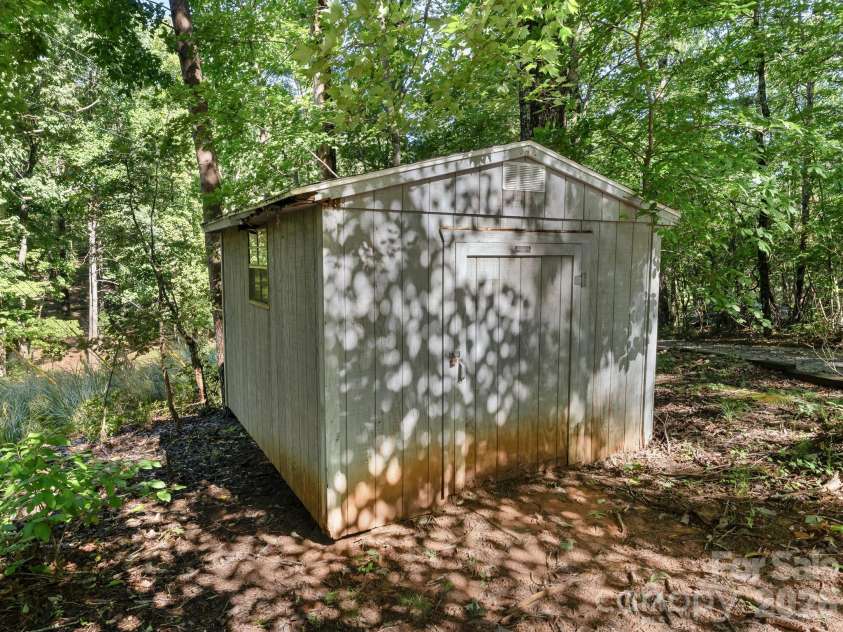 600 Piney Gate Road, Saluda, NC 28773.  MLS# CAR4423662, YatesRealty ID 53356. Storage building is old.