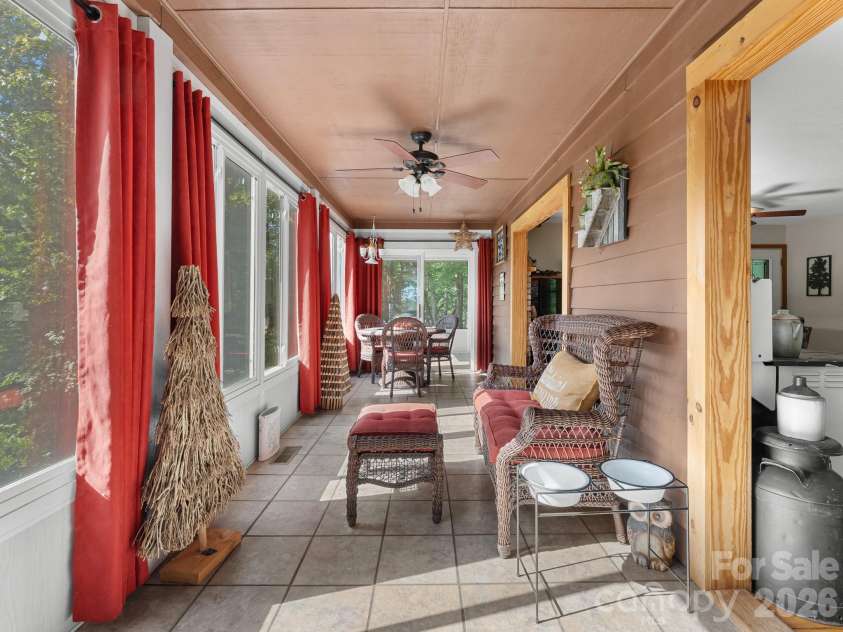 600 Piney Gate Road, Saluda, NC 28773.  MLS# CAR4423662, YatesRealty ID 53356. Sunroom