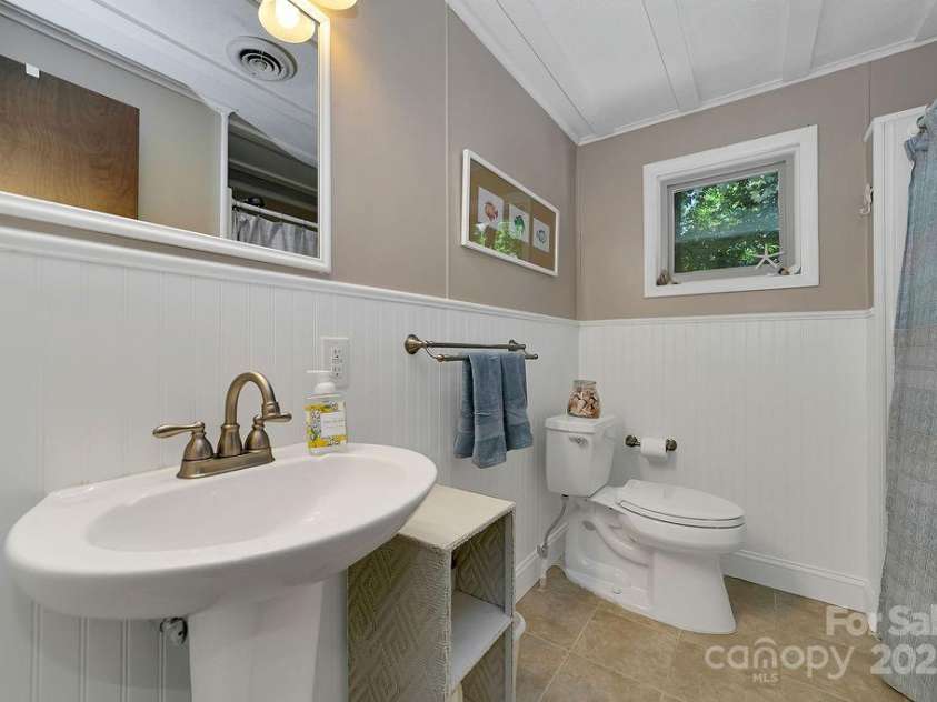 57 Echota Lane, Brevard, NC 28712.  MLS# CAR4230498, YatesRealty ID 5336. 2nd Full Bath on Main Level