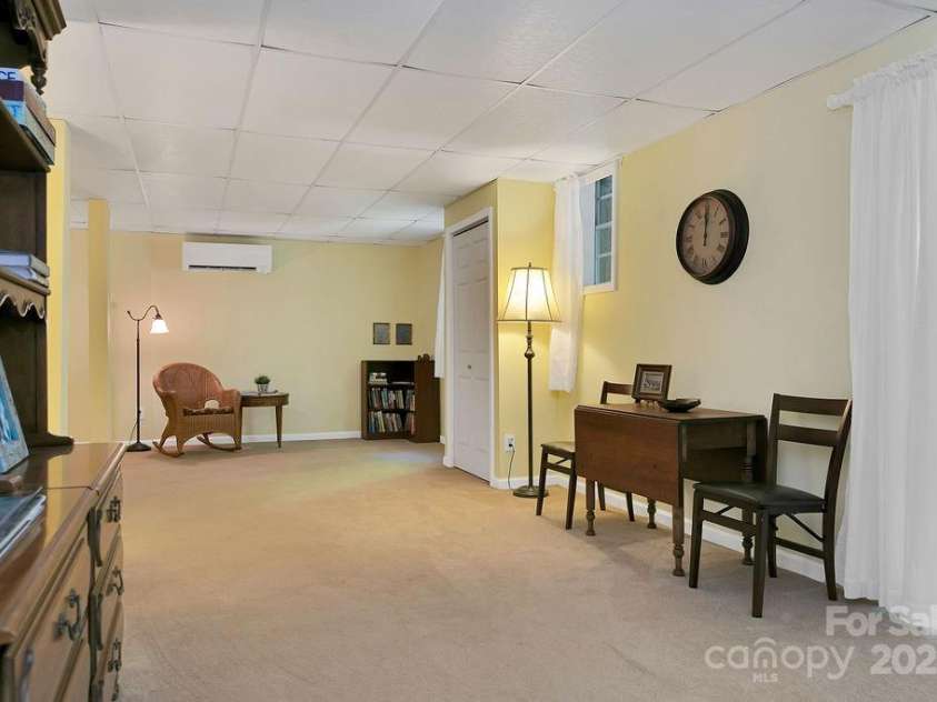 57 Echota Lane, Brevard, NC 28712.  MLS# CAR4230498, YatesRealty ID 5336. Basement walk out flex space