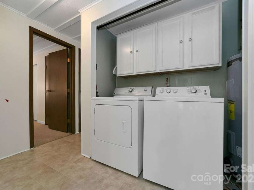 57 Echota Lane, Brevard, NC 28712.  MLS# CAR4230498, YatesRealty ID 5336. Laundry Closet on main