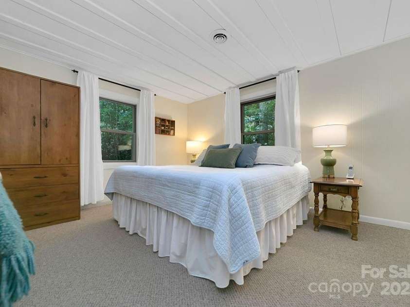 57 Echota Lane, Brevard, NC 28712.  MLS# CAR4230498, YatesRealty ID 5336. Primary Bedroom