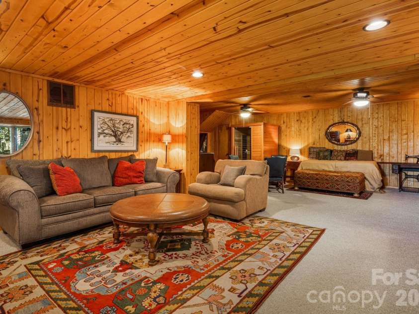 342 Granny Lewis Lane, Mars Hill, NC 28754.  MLS# CAR4428458, YatesRealty ID 53365. Lower level living room