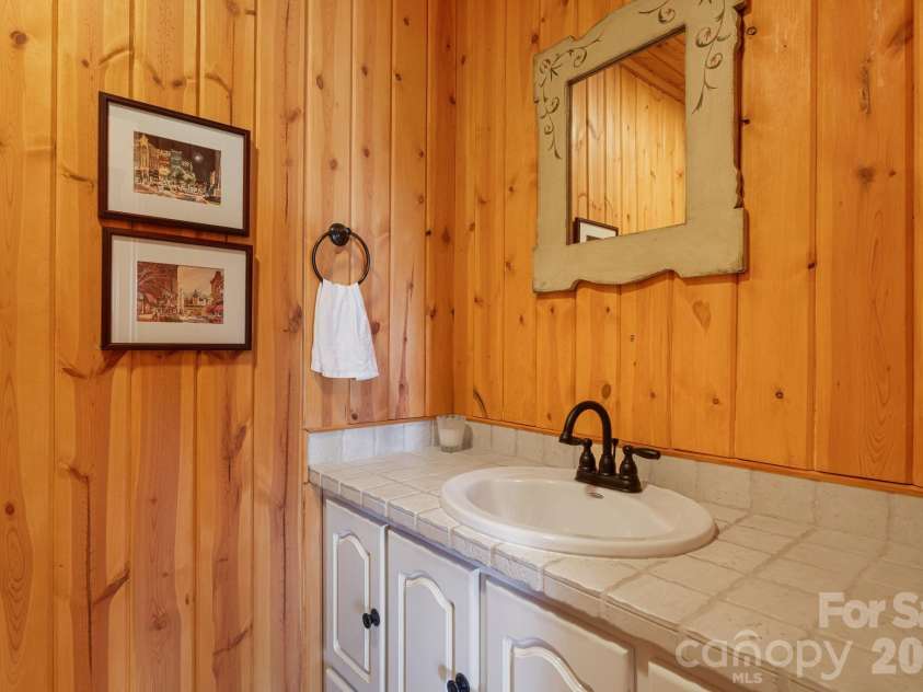 342 Granny Lewis Lane, Mars Hill, NC 28754.  MLS# CAR4428458, YatesRealty ID 53365. Main Level Half Bath
