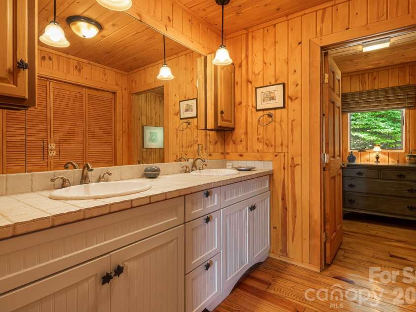 342 Granny Lewis Lane, Mars Hill, NC 28754.  MLS# CAR4428458, YatesRealty ID 53365. Main Level Primary Bathroom