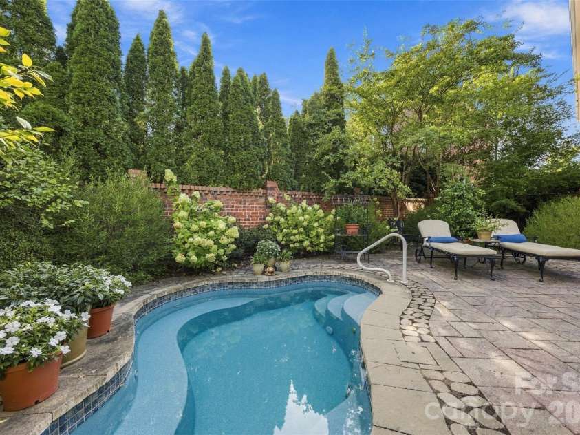 240 Hawthorne Park Avenue, Belmont, NC 28012.  MLS# CAR4428825, YatesRealty ID 53367. Backyard heated pool