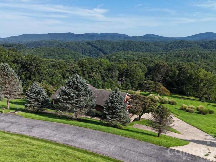 93 Orchard Hill, Saluda, NC 28773.  MLS# CAR4422380, YatesRealty ID 53372. 