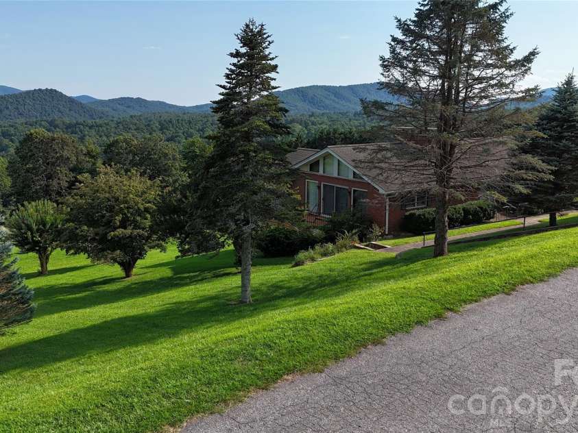 93 Orchard Hill, Saluda, NC 28773.  MLS# CAR4422380, YatesRealty ID 53372. 