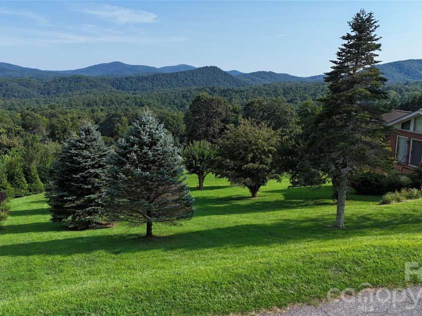 93 Orchard Hill, Saluda, NC 28773.  MLS# CAR4422380, YatesRealty ID 53372. 