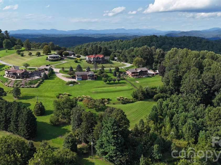 93 Orchard Hill, Saluda, NC 28773.  MLS# CAR4422380, YatesRealty ID 53372. 