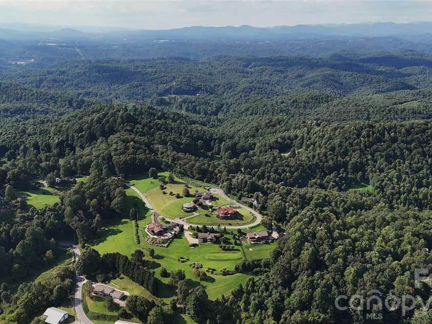 93 Orchard Hill, Saluda, NC 28773.  MLS# CAR4422380, YatesRealty ID 53372. 