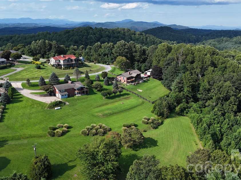 93 Orchard Hill, Saluda, NC 28773.  MLS# CAR4422380, YatesRealty ID 53372. 