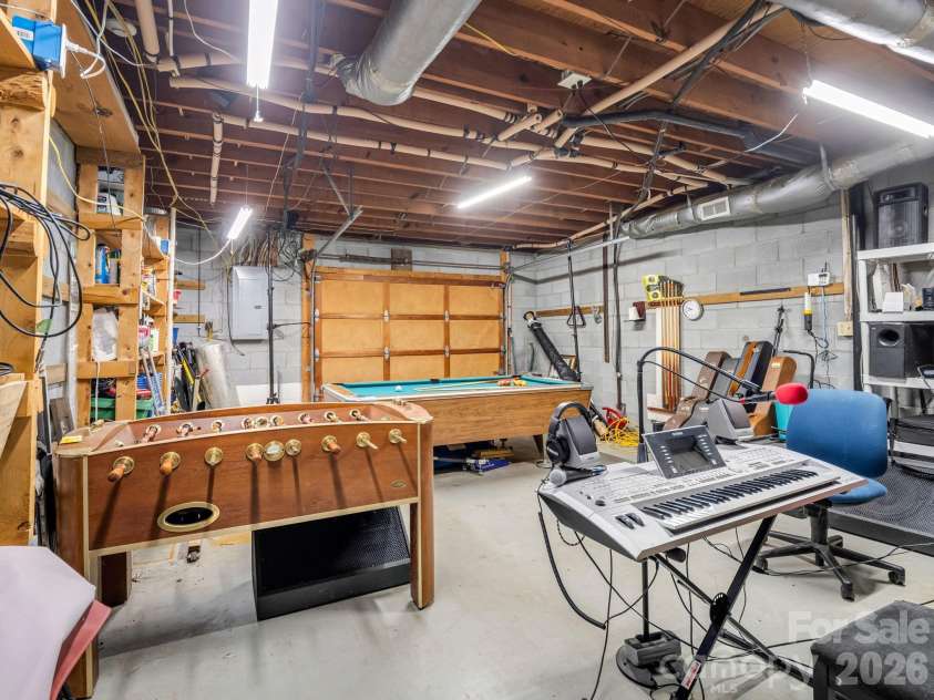 48 Roberts Cove Road, Weaverville, NC 28787.  MLS# CAR4423939, YatesRealty ID 53379. Garage