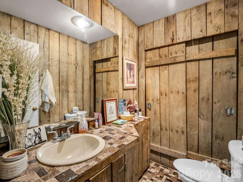 48 Roberts Cove Road, Weaverville, NC 28787.  MLS# CAR4423939, YatesRealty ID 53379. Half Bathroom
