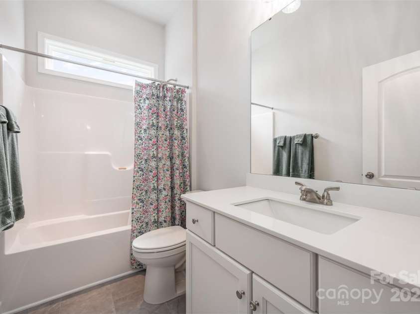 456 Lucky Drive, Concord, NC 28027.  MLS# CAR4235721, YatesRealty ID 5338. Full bathroom in hallway