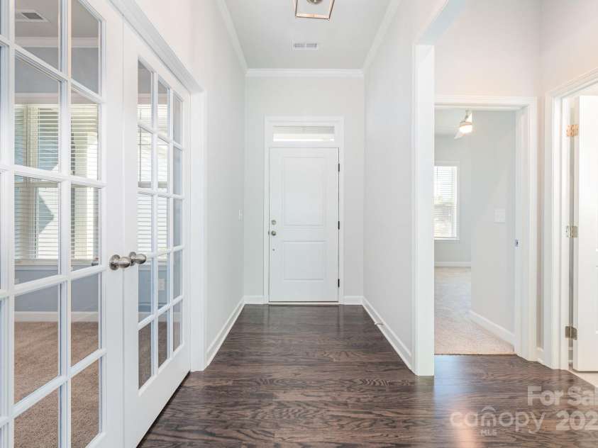 456 Lucky Drive, Concord, NC 28027.  MLS# CAR4313263, YatesRealty ID 5338. Entry foyer with an office right near the front door.