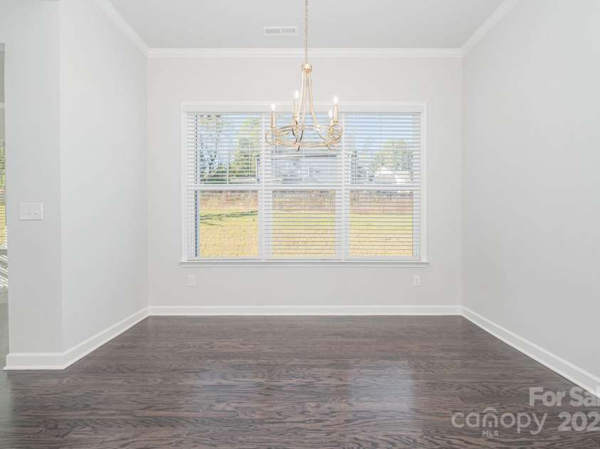 456 Lucky Drive, Concord, NC 28027.  MLS# CAR4313263, YatesRealty ID 5338. Roomy breakfast/dining area.