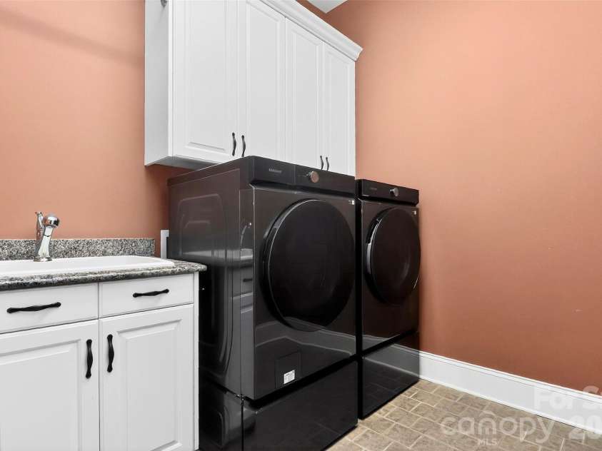 6031 Greystone Drive, Matthews, NC 28104.  MLS# CAR4428861, YatesRealty ID 53381. 