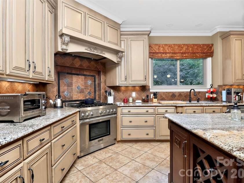 6031 Greystone Drive, Matthews, NC 28104.  MLS# CAR4428861, YatesRealty ID 53381. 
