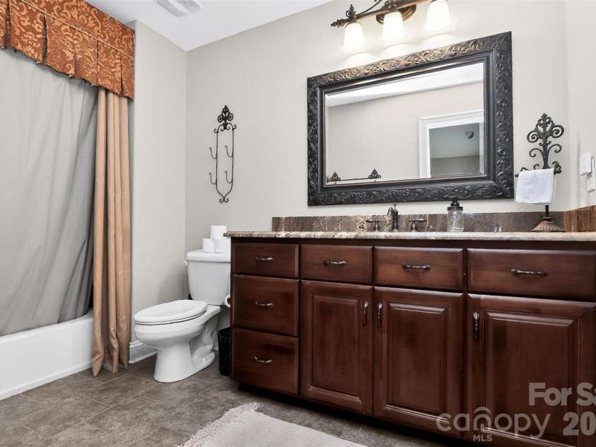 6031 Greystone Drive, Matthews, NC 28104.  MLS# CAR4428861, YatesRealty ID 53381. 