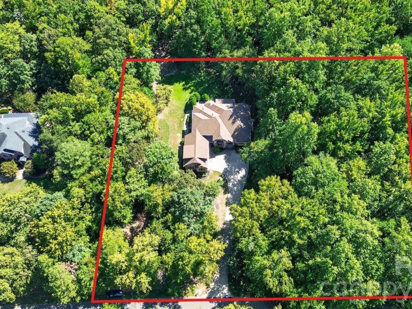 6031 Greystone Drive, Matthews, NC 28104.  MLS# CAR4428861, YatesRealty ID 53381. 