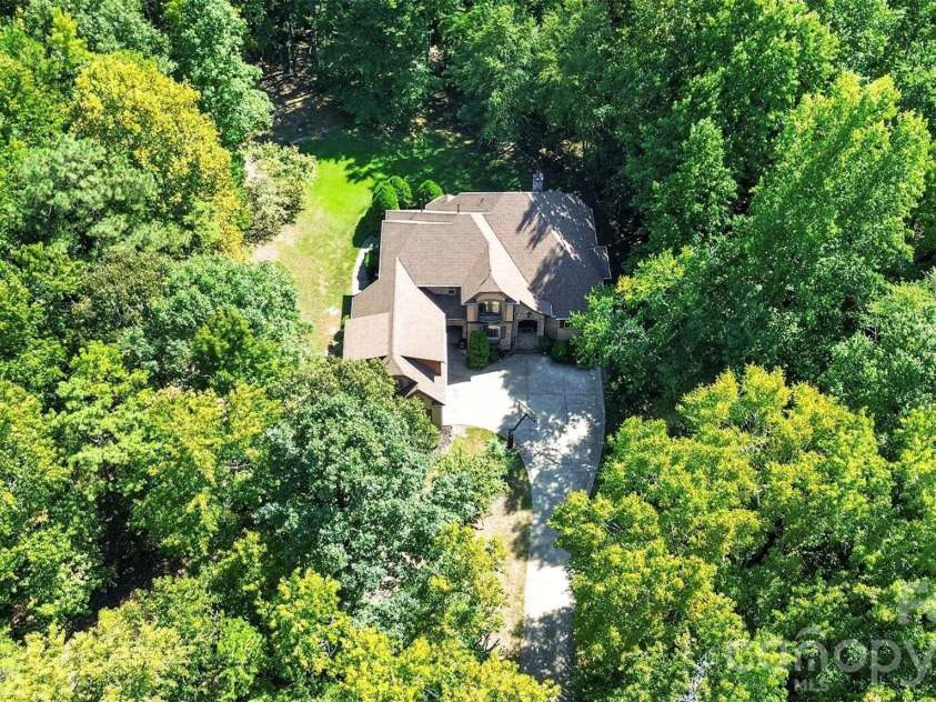 6031 Greystone Drive, Matthews, NC 28104.  MLS# CAR4428861, YatesRealty ID 53381. 