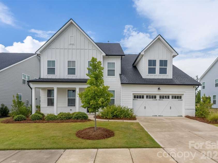 4230 Tournette Drive, Indian Land, SC 29707.  MLS# CAR4423443, YatesRealty ID 53382. Front elevation and driveway