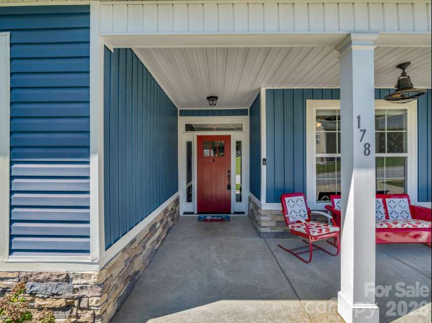 178 Page Creek Boulevard, Landrum, SC 29356.  MLS# CAR4428933, YatesRealty ID 53387. Covered front porch