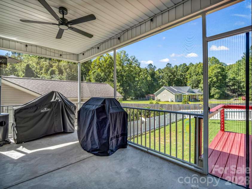 178 Page Creek Boulevard, Landrum, SC 29356.  MLS# CAR4428933, YatesRealty ID 53387. Screen porch and deck