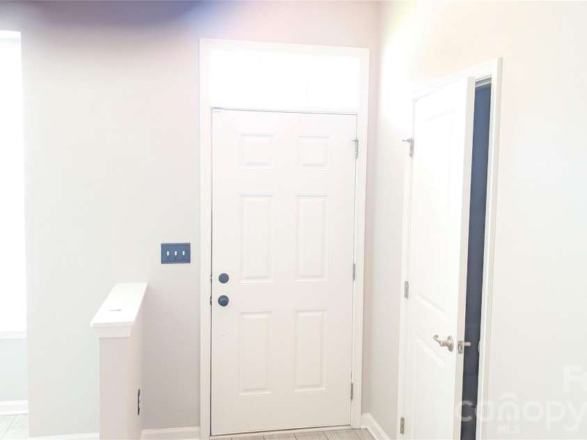 1645 Fleetwood Drive, Charlotte, NC 28208.  MLS# CAR4428546, YatesRealty ID 53392. Front Door entry