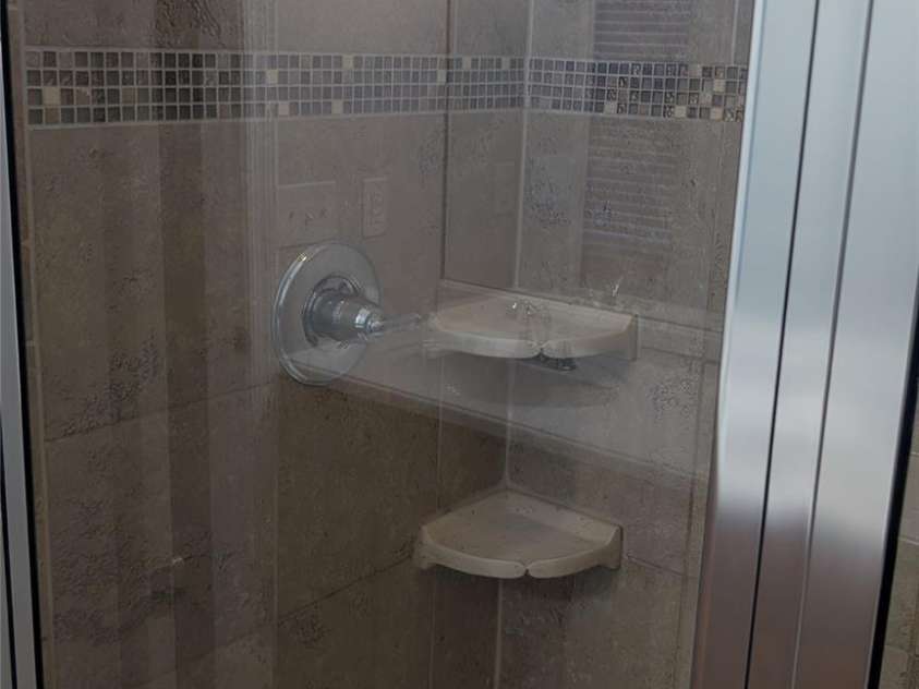 1645 Fleetwood Drive, Charlotte, NC 28208.  MLS# CAR4428546, YatesRealty ID 53392. Master Bath Shower