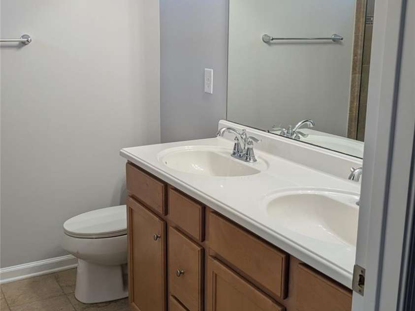 1645 Fleetwood Drive, Charlotte, NC 28208.  MLS# CAR4428546, YatesRealty ID 53392. Master Bath Vanity