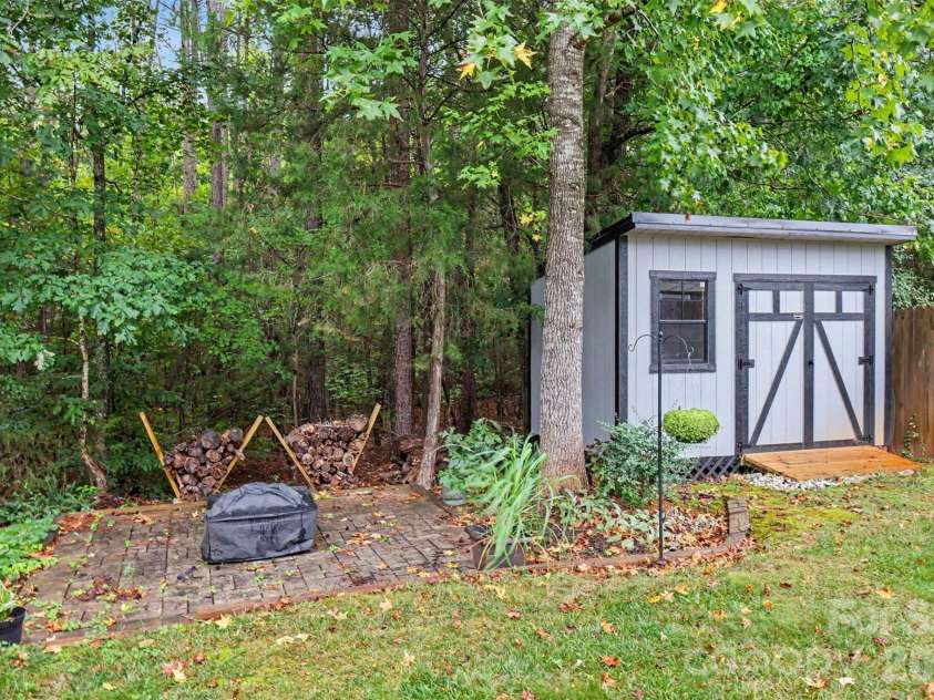 3743 Travertine Drive, Lancaster, SC 29720.  MLS# CAR4426417, YatesRealty ID 53396. Custom shed that matches the house