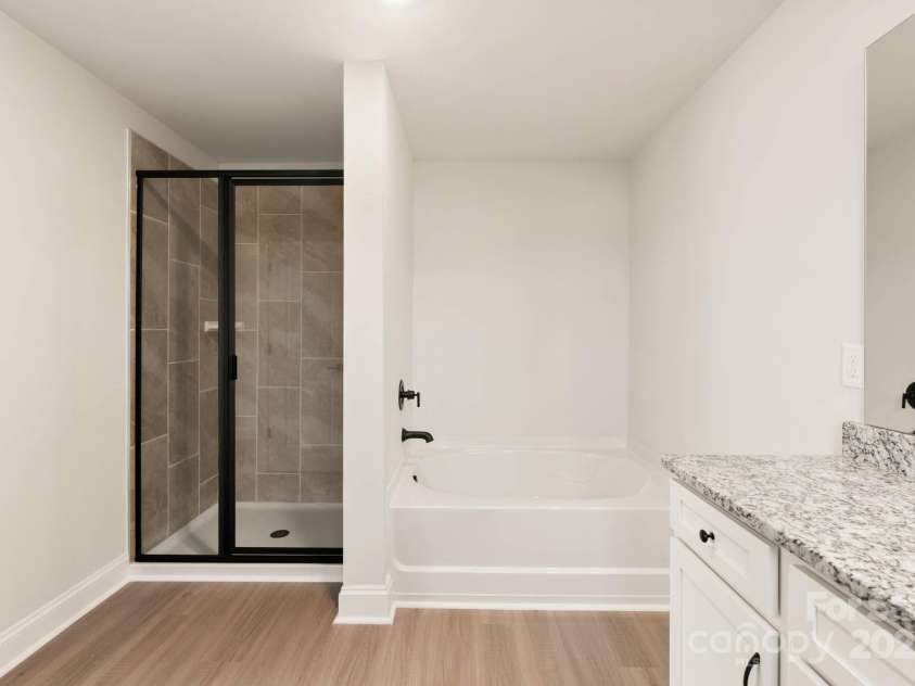 116 Kennford Trail, Troutman, NC 28166.  MLS# CAR4273336, YatesRealty ID 5340. Master bathroom