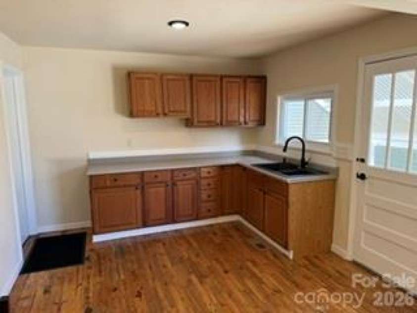 1110 Ridge Road, Hendersonville, NC 28792.  MLS# CAR4426893, YatesRealty ID 53404. 